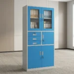 Blue office cabinet with safe featuring a steel construction with a white outer frame and vibrant blue doors/drawers, upper glass-panel double doors with key lock, a middle section with three stacked drawers on the left and a single lockable safe compartment on the right, and lower solid metal double doors with key lock.