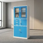 Blue office cabinet with safe featuring a steel construction with a white outer frame and vibrant blue doors/drawers, upper glass-panel double doors with key lock, a middle section with three stacked drawers on the left and a single lockable safe compartment on the right, and lower solid metal double doors with key lock.