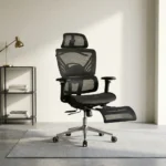 Recliner orthopedic chair with footrest featuring a breathable full-black mesh construction, an adjustable mesh headrest, a multi-segmented high backrest with specialized lower lumbar support, 3D adjustable armrests, a retractable mesh footrest, and a polished metallic five-star base on smooth-rolling casters.