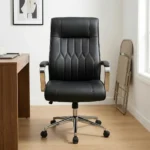 Black leather mid-back office chair featuring diamond-pattern tufted stitching, padded chrome armrests, and a polished metal 5-star swivel base.