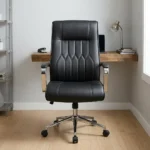 Black leather mid-back office chair featuring diamond-pattern tufted stitching, padded chrome armrests, and a polished metal 5-star swivel base.