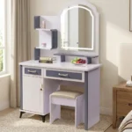 Modern white dressing table featuring a two-tone white and charcoal gray finish, an arched vanity mirror with an integrated touch-sensor LED light rim, open side display shelves, two storage drawers, a lower single-door cabinet, and a matching padded vanity stool.