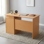 1.2m wooden office table featuring a light oak wood finish, a rectangular desktop with a circular wire management grommet, a half-height modesty panel, and an integrated side pedestal with three lockable drawers with metal bar handles.