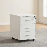 3-drawer mobile pedestal featuring a clean white finish, three stacked storage drawers with slim silver metal pull handles, a central key locking mechanism on the top drawer, and four smooth-rolling black caster wheels for easy mobility.