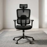 High-back orthopedic office seat featuring an all-black ergonomic design with a split mesh backrest, an adjustable mesh headrest, integrated dynamic lumbar support, a padded fabric seat cushion, height-adjustable T-armrests, pneumatic height adjustment lever, and a durable black five-star base on smooth-rolling casters.