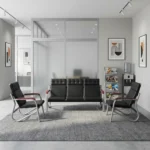 5-seater reception waiting sofa set featuring a 3-seater bench and two matching single-seater armchairs, constructed with durable silver metal tubular frames, black grid-tufted faux leather seats and backrests, and contrasting reddish-brown padded armrests.