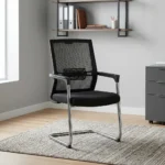 Mesh back office waiting chair featuring a breathable black mesh backrest with built-in adjustable lumbar support, a cushioned black fabric seat, fixed armrests with black arm pads, and a polished chrome tubular metal cantilever sled base.