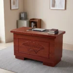 120cm office table with drawers featuring a rich mahogany/cherry wood veneer finish, a central black desk pad inset on the desktop, and a decorative front modesty panel with a carved fan shell motif and textured border molding.