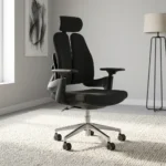 Dual back orthopedic office chair featuring an ergonomic split twin-backrest design in black upholstery, an adjustable curved headrest, padded black fabric seat cushion, adjustable T-shaped armrests, pneumatic tilt and height adjustment mechanism, and a polished aluminum five-star swivel base on dual-wheel casters.