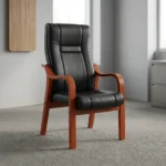 High-back executive visitors chair featuring plush black leatherette upholstery with stitched paneling, ergonomic lumbar and back support, padded seat cushion, and a sturdy solid wood frame with warm mahogany-finished curved armrests and four fixed legs.
