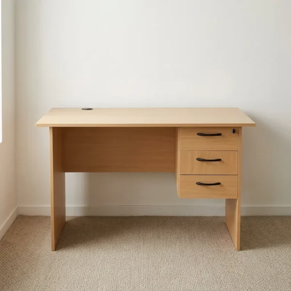 1200mm office study table featuring a light natural oak wood laminate finish, a rectangular desktop with a built-in cable grommet, a full-width rear modesty panel, and an integrated right-side pedestal with three drawers, curved black handles, and a top-drawer key lock.