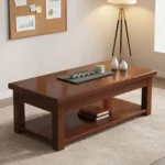 1200mm rectangular coffee table featuring a polished warm mahogany wood finish, a smooth rectangular top with thick aprons, a full-length lower open storage shelf, and sturdy square post legs.
