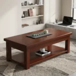 1200mm rectangular coffee table featuring a polished warm mahogany wood finish, a smooth rectangular top with thick aprons, a full-length lower open storage shelf, and sturdy square post legs.