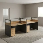 Straight 2-way workstation featuring a dual side-by-side desk setup in light oak laminate with charcoal grey side and back panels, semi-private frosted glass desktop divider screens with metal frames, and two matching under-desk 3-drawer pedestals with key locks.