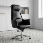 High back leatherette executive chair featuring smooth black faux leather upholstery, a tall contoured backrest with an integrated padded headrest pillow, sloping fixed armrests, tilt and height adjustment levers, and a polished aluminum five-star swivel base with caster wheels.