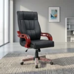 Bliss leather executive chair featuring plush black leather upholstery with vertical panel stitching, high-back ergonomic design, sculpted mahogany-toned wooden armrests with leather padding, height adjustment lever, and a matching five-star wooden swivel base with dual-wheel casters.