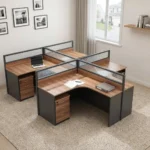 4-seater curved workstation featuring a quad L-shaped pod layout with teak wood-grain tabletops, dark grey side panels and modesty boards, semi-private divider screens with frosted slatted glass panels, and individual lockable under-desk mobile pedestal drawer units.