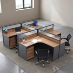 4-seater curved workstation featuring a quad L-shaped pod layout with teak wood-grain tabletops, dark grey side panels and modesty boards, semi-private divider screens with frosted slatted glass panels, and individual lockable under-desk mobile pedestal drawer units.