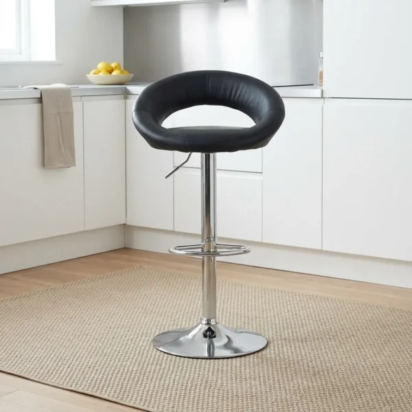 Leather swivel barstool featuring a rounded cutout backrest upholstered in smooth black faux leather, an adjustable gas-lift hydraulic pedestal base in polished chrome, an integrated semi-circular footrest, and a sturdy round trumpet base.