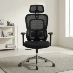 Ergonomic orthopedic staff office chair featuring a high-tension black mesh backrest, an adjustable mesh headrest, dual adaptive lower lumbar support pads, a contoured fabric seat cushion, height-adjustable T-armrests, and a polished aluminum five-star swivel base with smooth-rolling casters.