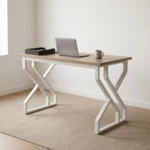1.2m generic computer desk featuring a natural walnut wood-grain tabletop, a smooth open work surface, and modern geometric geometric Z/X-shaped white metal powder-coated leg supports.