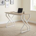 1.2m generic computer desk featuring a natural walnut wood-grain tabletop, a smooth open work surface, and modern geometric geometric Z/X-shaped white metal powder-coated leg supports.