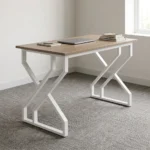 1.2m generic computer desk featuring a natural walnut wood-grain tabletop, a smooth open work surface, and modern geometric geometric Z/X-shaped white metal powder-coated leg supports.