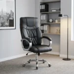 Black leather office chair featuring high-density black leather upholstery with contrast amber/orange stitching, a high backrest with an integrated headrest cushion, padded silver curved armrests, a height adjustment lever, and a polished chrome five-star swivel base with caster wheels.
