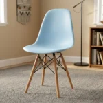 High quality Eames chair featuring a light blue molded polypropylene seat shell, natural solid wood dowel legs, and Eiffel-style black wire metal cross-bracing.