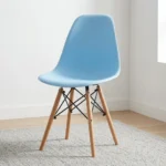 High quality Eames chair featuring a light blue molded polypropylene seat shell, natural solid wood dowel legs, and Eiffel-style black wire metal cross-bracing.