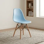 High quality Eames chair featuring a light blue molded polypropylene seat shell, natural solid wood dowel legs, and Eiffel-style black wire metal cross-bracing.