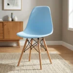 High quality Eames chair featuring a light blue molded polypropylene seat shell, natural solid wood dowel legs, and Eiffel-style black wire metal cross-bracing.