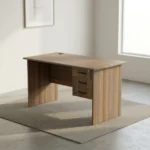 0.9m office study desk featuring a compact natural walnut wood-grain finish laminate desktop, built-in cable grommet, matching modesty panel, and an integrated right-side storage pedestal with three drawers, dark curved handles, and a top-drawer key lock.