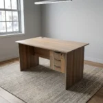 0.9m office study desk featuring a compact natural walnut wood-grain finish laminate desktop, built-in cable grommet, matching modesty panel, and an integrated right-side storage pedestal with three drawers, dark curved handles, and a top-drawer key lock.