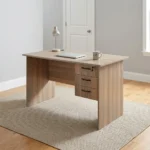 0.9m office study desk featuring a compact natural walnut wood-grain finish laminate desktop, built-in cable grommet, matching modesty panel, and an integrated right-side storage pedestal with three drawers, dark curved handles, and a top-drawer key lock.