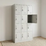 12 locker office file cabinet featuring a durable light grey metal construction, 12 individual lockable storage compartments arranged in a 3x4 grid, individual key locks, recessed silver handles, name card holders, and ventilation louvers on each door.