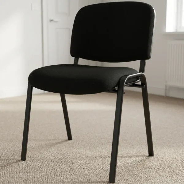 Low back fabric tosca chair featuring armless black woven fabric upholstery on a padded seat and rectangular backrest, supported by a durable black powder-coated metal tubular frame with angled legs.