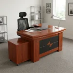 1.6m executive office table featuring a warm reddish-brown wood-grain finish, an inlaid black leather writing pad, integrated dual cable management grommets, an attached side return credenza, a mobile low-profile pedestal cabinet, and a decorative black and wood-tone diamond-pattern front modesty panel.