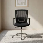 Medium back orthopedic office chair featuring a breathable black mesh backrest with integrated lumbar support, a contoured padded black fabric seat cushion, height-adjustable T-armrests, pneumatic height adjustment lever, and a sleek chrome five-star swivel base on smooth-rolling casters.