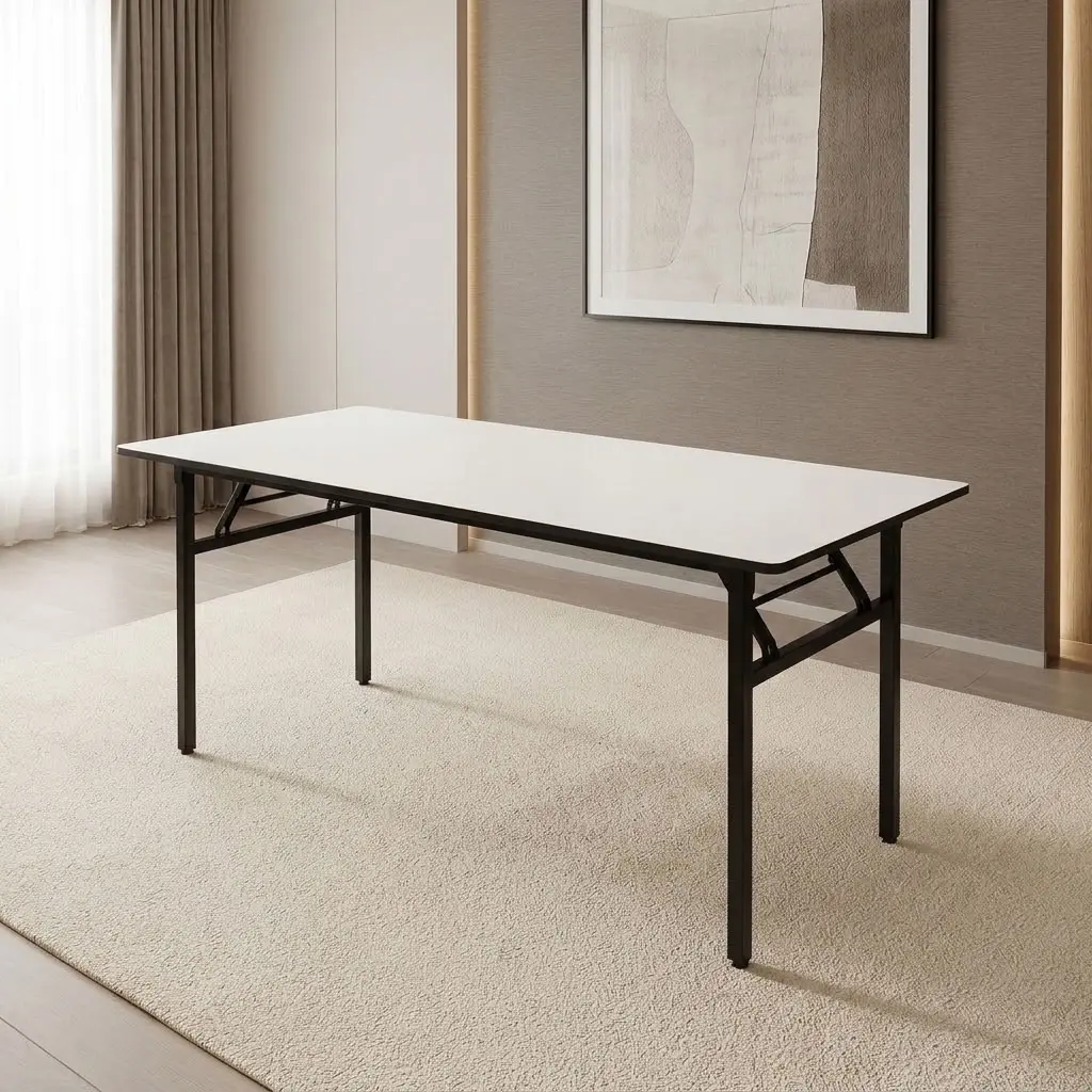 1.8m foldable training table featuring a smooth white laminate tabletop with dark trim, supported by a heavy-duty black powder-coated steel frame with collapsible fold-flat legs and cross-brace locking mechanisms.