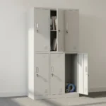6-door steel storage locker cabinet featuring a light grey powder-coated metal finish, six individual locking compartments arranged in a 3-column by 2-tier layout, key locks with keyrings, recessed vertical handles, ventilation louvers, and built-in label holders on each door.