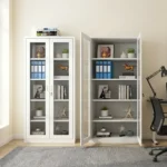 Full glass office file cabinet featuring a clean white powder-coated steel frame, full-length double tempered glass doors with recessed handles and a key lock, and four spacious interior shelves providing five tiers of visible storage.