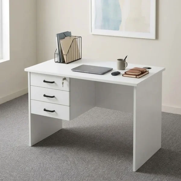 1.2m white study office desk featuring a clean matte white laminate desktop, a circular cable management grommet, an integrated three-drawer fixed pedestal with black horizontal pull handles and a top-drawer key lock mechanism, a full-length white modesty panel, and sturdy engineered wood side panel legs.