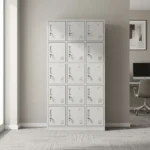 Steel 15-door locker cabinet featuring a durable light grey powder-coated steel frame, fifteen individual compartment doors arranged in a 3x5 grid with selectable open/closed doors, integrated ventilation louver slots, recessed label holders, individual key lock mechanisms with metal pull handles, and a reinforced floor-standing base.