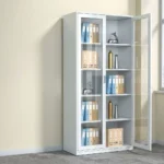 Steel full glass storage cabinet featuring a powder-coated white steel frame, dual full-length tempered glass hinged doors with recessed vertical pull handles and key lock system, four interior height-adjustable steel shelves creating five spacious storage tiers, and a flat reinforced floor-standing base.