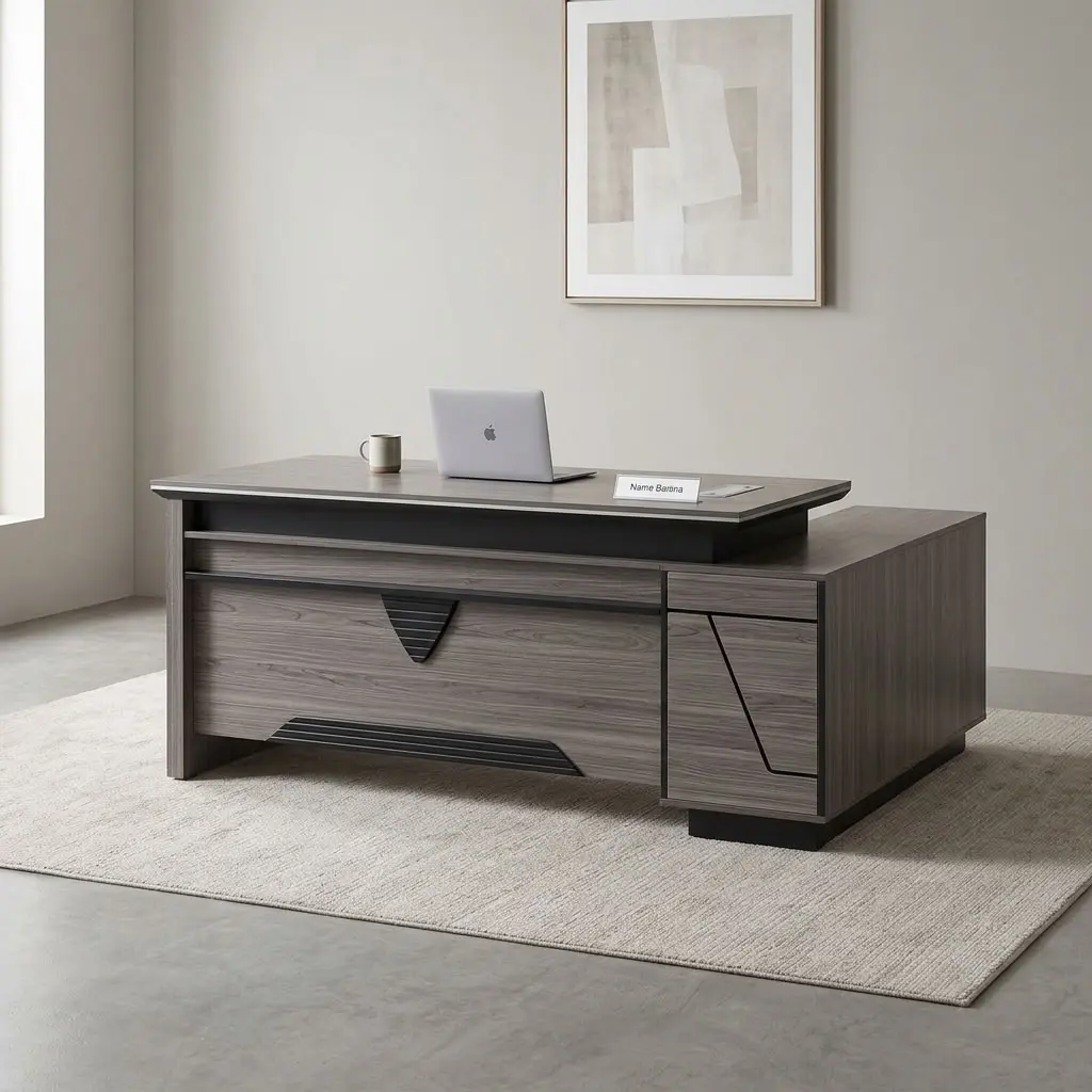 180cm Office Table with Extension featuring a contemporary grey wood-grain laminate finish, an integrated desktop flip-top cable management box, a front modesty panel with geometric black accent detailing, a side return extension unit with integrated cabinet storage, and sturdy engineered wood panel legs.