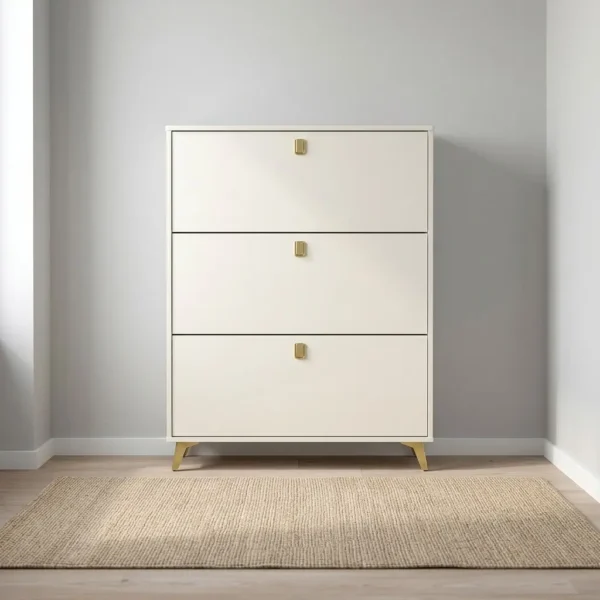 3 layer wooden shoe rack featuring an off-white engineered wood frame, three pull-out tilt drawer compartments with brushed brass hardware handles, internal double-tier shoe organization racks, and tapered brushed brass corner leg supports.