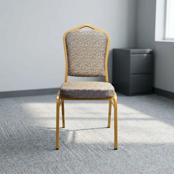 Comfortable armless fabric conference chair featuring patterned beige fabric upholstery over a thick padded seat cushion and backrest, an armless stackable crown-back frame design with an integrated top hand-hold handle, and a durable gold powder-coated square steel four-legged base.