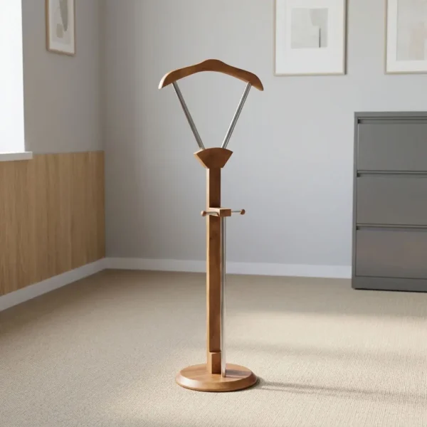 Modern wooden coat hanger featuring a natural teak-finish solid wood structure, a wide contoured top jacket hanger supported by a V-shaped metallic frame, a central wooden post with a mid-height horizontal accessory bar and vertical umbrella holder, and a weighted circular wooden disc base.