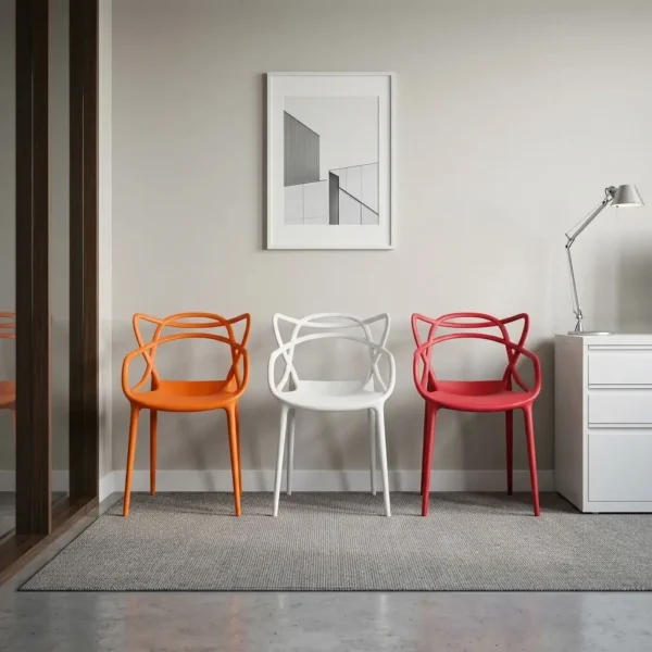 Outdoor stackable plastic chair featuring a weather-resistant molded polypropylene plastic body with an intricate interlocking loop backrest and integrated armrests, a contoured seat pan, and a space-saving stackable structure available in orange, white, and red finishes, supported by four integrated tapered legs with non-marking floor glides.